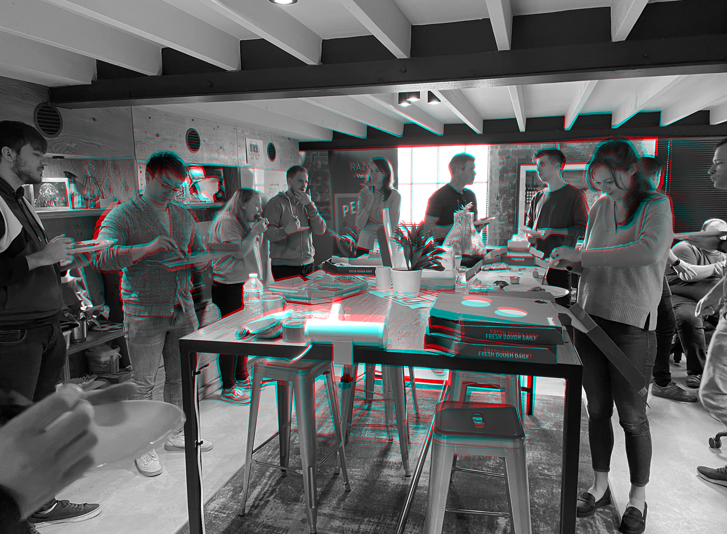 Razor team enjoying some fresh pizza!